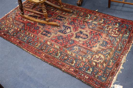 A North West Persian red ground rug, 190 x 103cm